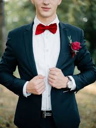 Black And White Suit With Red Bow Tie Enchanted Forest Marsala Wedding Inspiration High Neck Wedding Dress Groom Attire High Neck Wedding Dress Red Bow Tie