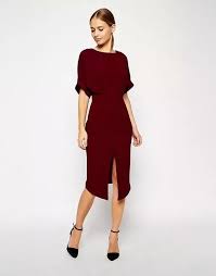 This vibrant hue may be an unexpected choice when it comes to fall wedding colors, but it definitely brings the wow factor — just take a look at this elegant invitation suite featuring a marigold. 8 Fall Wedding Guest Dresses That Will Turn Heads This Season Mywedding Wedding Attire Guest Winter Wedding Outfits Dresses To Wear To A Wedding