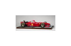 Requires 4 aa batteries for the car and 2 aa batteries for the controller (batteries are not included). Bonhams A 1 4 Scale Model Of A Ferrari F301b By Javan Smith