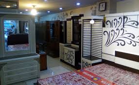 Wooden lcd wall unit design along with price in karachi. From Impoverished Teenager To Furniture King Arab News