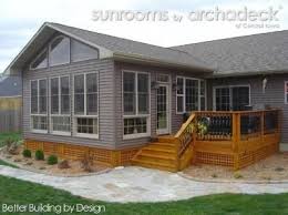 How Much Does It Cost To Build A Sunroom Addition Pin By Archadeck Of Central Iowa On Rooms We Designed Built Home Additions Family Room Addition Bedroom Addition