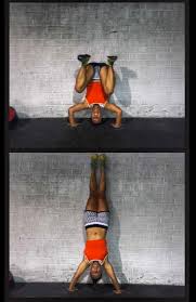 the kipping handstand push up