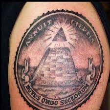 35 Arresting Money Tattoos Slodive Money Tattoo Pyramid Tattoo Hand Tattoos