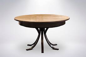 Large baluster posts with cove and ogee details, and a stretcher underneath give this table a dynamic design that's crafted to last. Dining Tables Johnson Furniture