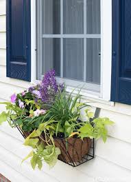 These bad boys are perfectly holding my large flower basket in place. Window Flower Basket On Vinyl Siding Place Of My Taste