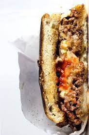This Bronx Specialty Called Chopped Cheese Is Spiced Up Even More With Sriracha In The Patty Chopped Cheese Food Breakfast Brunch Recipes