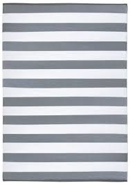 This solid cream rug features an asymmetrical triangle motif that creates a global look and unique statement piece. Stripes Grey And White Recycled Plastic Indoor Outdoor Rug Outdoor Rugs