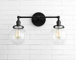 It endeavors to provide the products that you want, offering the best bang for your buck. Industrial Vanity Vanity Light Hardwired Light Bathroom Etsy Black Light Fixture Black Bathroom Light Black Bathroom Light Fixtures