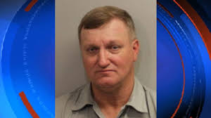 Truck driver accused of smashing out window with baseball bat