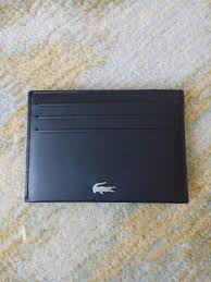 Lacoste credit card holder in black takes a modern and simple approach to storing your bank or id cards over the new season and beyond with a more minimalist design. Original Lacoste Fitzgerald Leather Credit Card Wallet Men S Fashion Watches Accessories Wallets Card Holders On Carousell