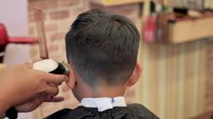 Selecting toddler boy haircuts can be difficult sometimes. Kid Haircut Razor Close Hair Trimmer Hairstyle Professional Hair Stylist Video By C Karlstury Stock Footage 251042996