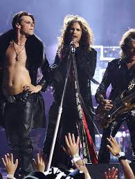 Aerosmith's Steven Tyler and Joe Perry joined a shirtless Yungblud on stage  at the VMAs for a tribute to the late Ozzy Osbourne. Head to Just Jared for  more show coverage! #StevenTyler #