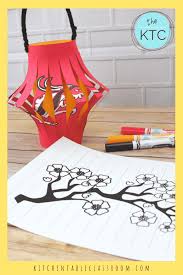 Cut a rectangle from your paper or card 16 cm by 14cm, and a small strip 12cm by 1.5cm. How To Make A Chinese Lantern A Chinese New Year Craft The Kitchen Table Classroom
