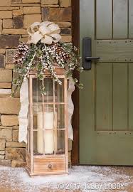 Turn Outdoor Lanterns Into A Winter Focal Piece With Christmas Foliage Just Use Floral Wire To Christmas Lanterns Christmas Decorations Rustic Christmas Porch