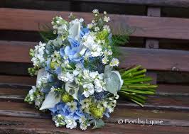 Check spelling or type a new query. Bouquet Of Light Blue Hydrangea And White Lily Google Search Blue Wedding Bouquet Wedding Flowers Blue Orchids White Wedding Bouquets