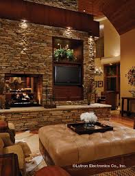 add finire led recessed lighting from the lutron ivalo collection to create the perfect ambian fireplace design living room with fireplace trendy living rooms