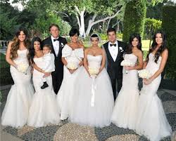 Kim kardashian and kanye west on their wedding day. Kim Kardashian Wedding Photos Kim Kardashian Wedding Dress Photo Kim Kardashian Wedding Kardashian Wedding Mermaid Bridesmaid Dresses