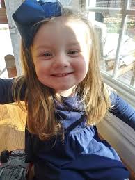 Why was Mica found in the river wearing her work shirt when she was seen  without it earlier?