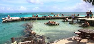 Located one mile west of belize barrier reef, caye caulker is a a four mile long island, part of a chain of islands forming the. File The Split Caye Caulker Belize Jpg Wikipedia