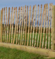 Wood fence panels provide shade and create structure in the landscape. Chestnut Paling Fence Roll Approx 5 M Wide By 1 2 M