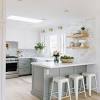 White backsplash with gray kitchen cabinets. 3