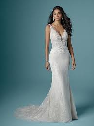 In fashion, a sheath dress is a fitted, straight cut dress, often nipped at the waistline with no waist seam. Elaine Lace Sheath Gown Ivory Hi Res Sottero Wedding Dress Maggie Sottero Wedding Dresses Wedding Dress Styles
