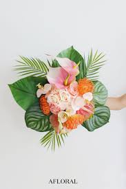Tropical wedding bouquets are a natural fit for a hawaiian wedding or a hawaii wedding at home. Create Your Dream Destination Wedding Bouquet With Fake Tropical Flowers Wedding Bouquet Fake Flowers Diy Wedding Bouquet Fake Flowers Diy Bouquet Fake Flowers