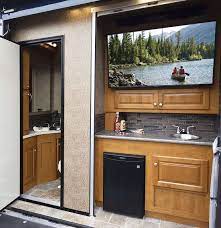 It measures 38″h x 24″w x 14″d when compacted for storage and extends to 80h x 75w x 37d. 10 Amazing Rvs Outdoor Entertaining Kitchens