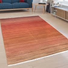 Kurzflor designer teppich paulig salsa 10 rot der paulig teppich salsa zeichnet sich vor allem durch seine hochwertige verarbeitung, den umweltfreundlichen materialen und seiner farbvielfalt. Teppich Moderner Kurzflor Teppich Fur Wohnzimmer Mit Farbverlauf In Rot Kaufen Bei Diva Teppich Center