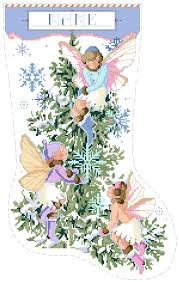 Bring the holiday spirit into your home with these charming cross stitch stockings. Kooler Design Studio Fairies Christmas Stocking Pdf