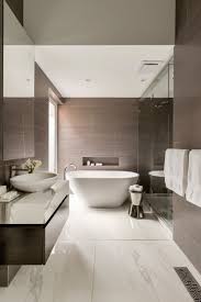 If you want to embrace your bold side, go big with a statement chandelier. Bathroom Tile Idea Use Large Tiles On The Floor And Walls 18 Pictures