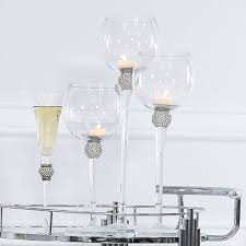 The candle holder is handmade in wood, which makes each piece unique and has a smooth finish which is this range's hallmark. Set Of 3 Wine Glass Style Candle Holders With A Diamante Ball On Stems Picture Perfect Home