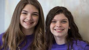 Bikini and a feeding tube: Howell teens help others with rare diseases