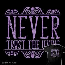 Great fit and quality, would buy again! Never Trust The Living Shirtoid