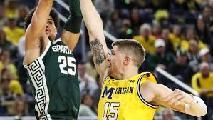 Michigan basketball tops Michigan State, 84-72, on emotional night