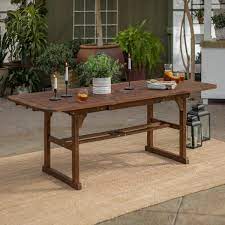 Do not use strong liquid cleaners and treat twice a year with water sealant. Walker Edison Furniture Company Boardwalk Dark Brown Acacia Wood Extendable Outdoor Dining Table Hdwtexdb The Home Depot