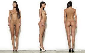 Nude art model standing - a sculptural form in the purity of art