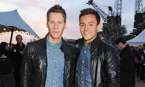 He now resides in london, england with his husband and british olympic diver tom daley. Tom Daley S Wedding Photos With Dustin Lance Black Will Make You Double Take Hello