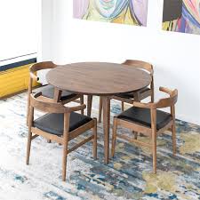 On the back of each chair is an angled, slatted design that gives this set an open and breezy look. Mid Century Modern Kathy Black Leather Dining Chair Set Of 2 Ash3196