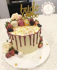 With your cake you should have fun with colours and the bolder the better. Fruit Drip Cake With Topper Cake Idea Engagment Party Engagement Party Cake Cake Buttercream Cake