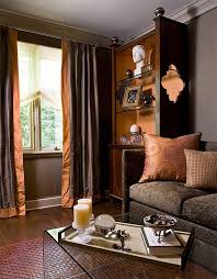 8 Ways To Fall Into Autumn With Rich Rust Colored Home Decor Brown Living Room Decor Living Room Orange Brown Living Room