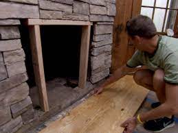 How to build an outdoor fireplace step by step. How To Cover A Brick Fireplace With Stone Hgtv