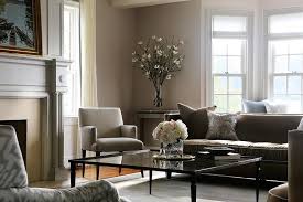 Gentle fawn is the type of brown that you can put on all walls of your living room without making it appear closed in, but at the same time it's. Gray And Brown Living Room With Glass Coffee Table Transitional Living Room