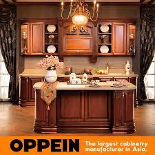 In fact, they can do everything from storing ingredients to stashing baking sheets and even offer a spot for family meals. China Italy Birch Luxury Solid Wood Kitchen Cabinets With Island Op14 122 China Kitchen Cabinets Kitchen Furniture