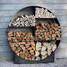In a similar way to the laminated squared log, the laminated round log. Circular Log Store Bbq S Firepits Outdoor Fires Fireside Accessories West Country Stoves