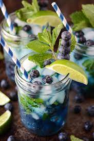 Celebrate The Mom To Be With These Adorable Baby Shower Ideas Mint Lemonade Recipe Lemonade Recipes Blueberry Mojito