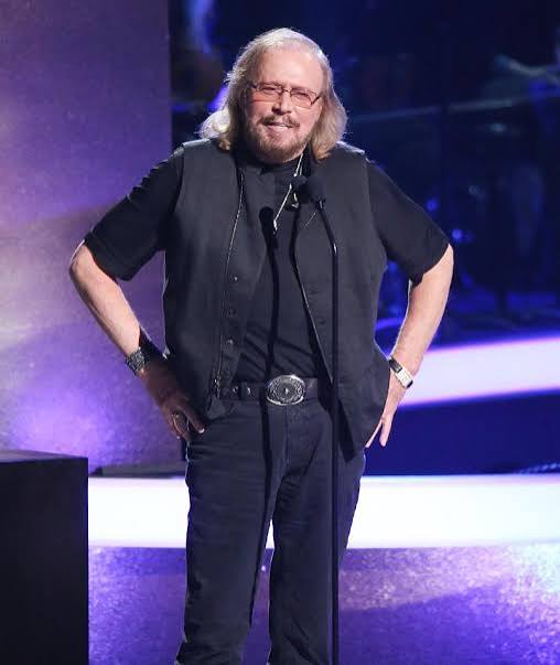 Who is Barry Gibb, how old is he, what's his net worth and what are his biggest songs with the Bee Gees'?