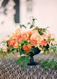 Celebrate this huge milestone with custom made wedding flowers you have always dreamt of. Monday S Picks Flower Arrangements Wedding Flowers Orange Centerpieces