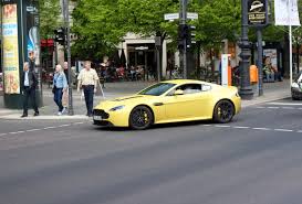 Image result for Sunburst Yellow 2012 Aston Martin