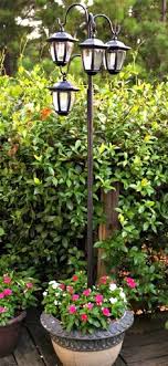 These are small solar lights on stakes, which can be pushed into the ground alongside a walkway to softly illuminate the path at night. 28 Diy Lamp Post Ideas For The Garden Balcony Garden Web